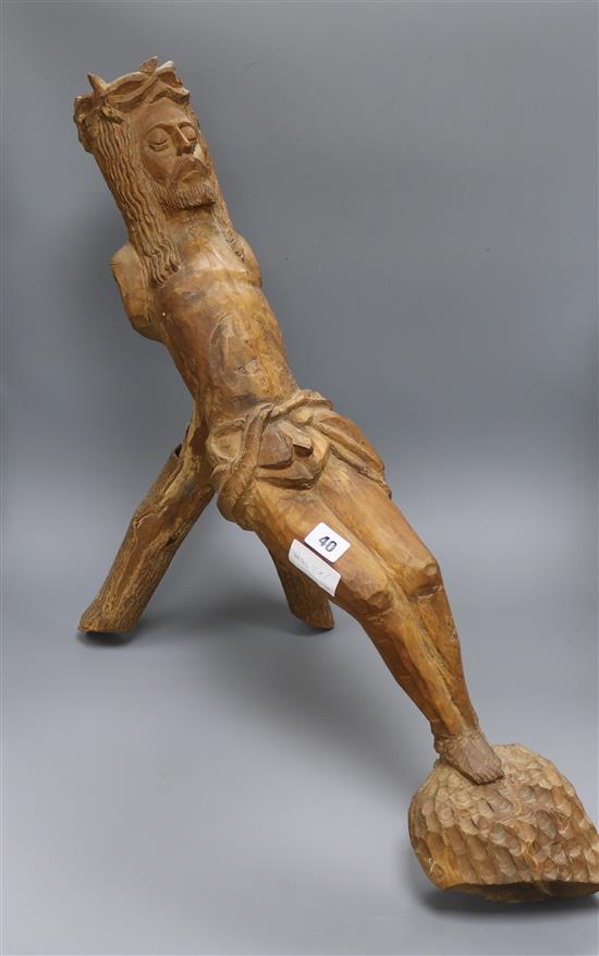 A carved wooden model of Christ height 59cm